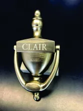 Doorknocker with deep routed name engraving